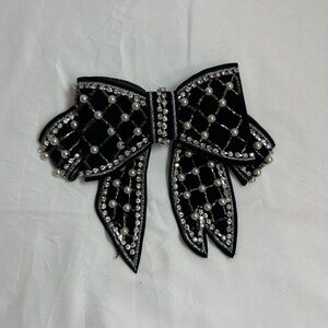 Elegant Black and Silver Bow Accessory